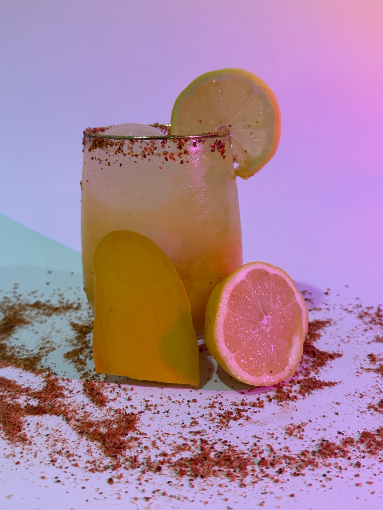 Mango Tango drink with lemon garnish
